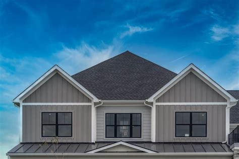 gray house black metal windows|gray siding black windows.